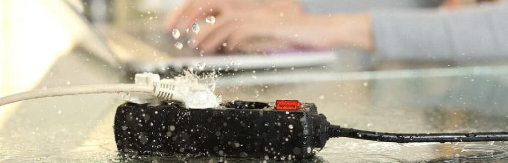 Image of water falling on a surge protector