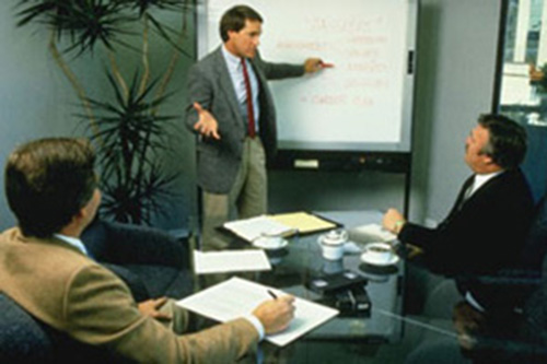Image depicting a boardroom meeting