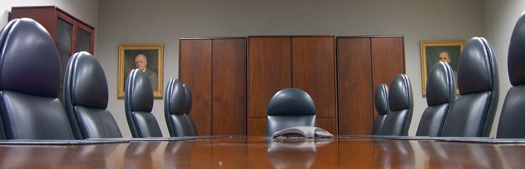 Table and chairs in a government conference room