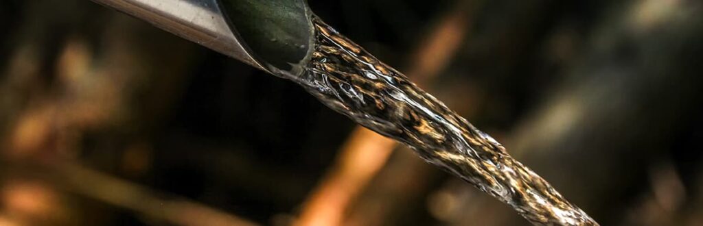 Close up of water coming out of a pipe