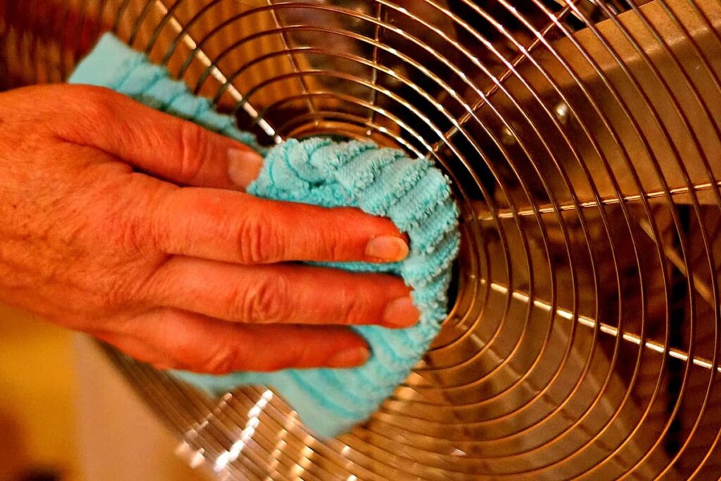 Cleaning off an indoor fan