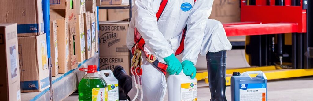 A worker in PPE demonstrating industrial hygiene practices