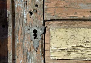 Close up of old, peeling paint on a door