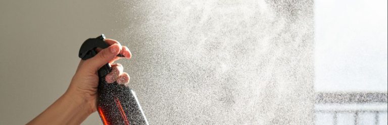 Volatile organic compounds are released into the air via a room scent spray container.